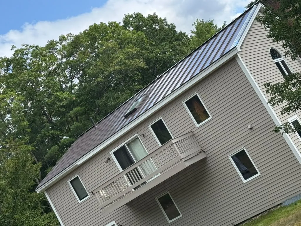 Metal roofing installation in Massachusetts by WCR Construction Inc