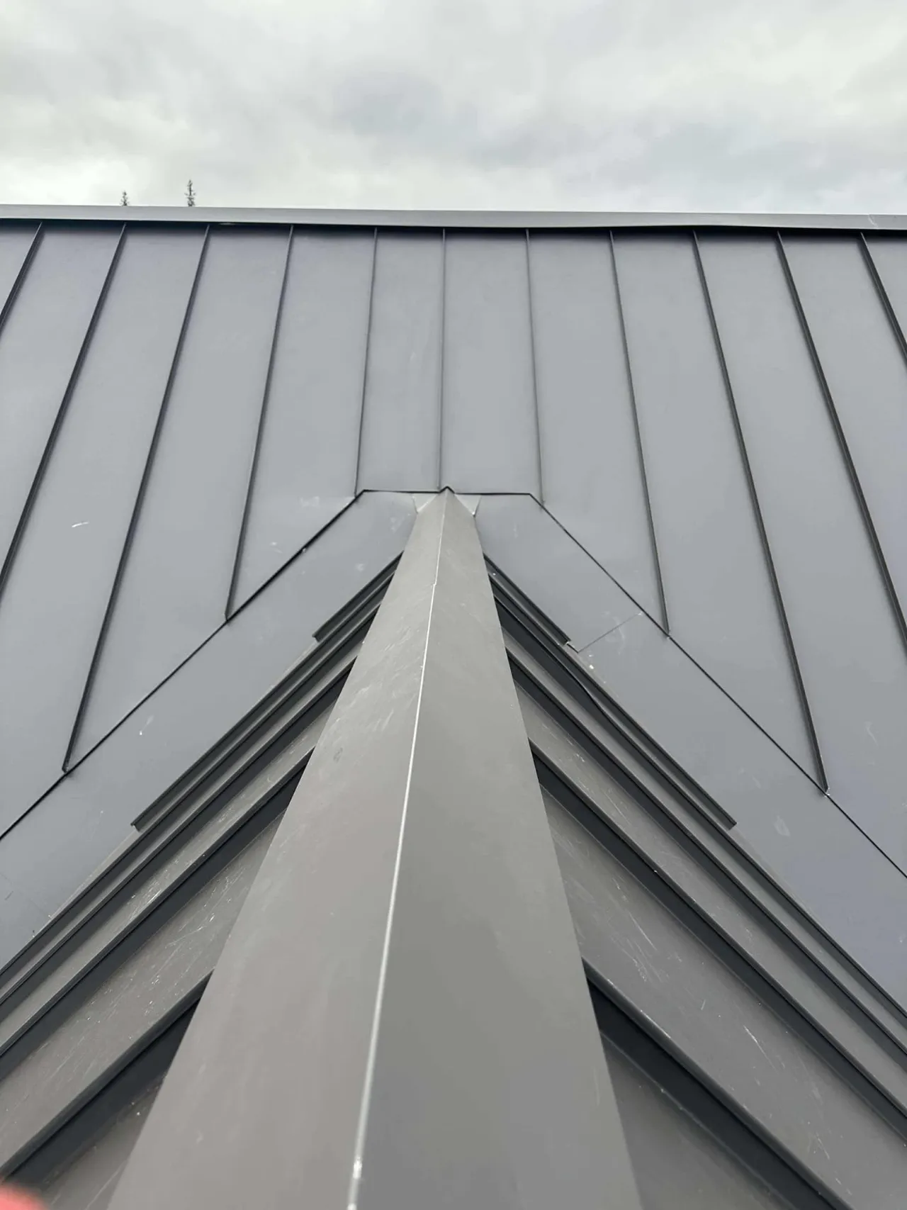 Standing seam metal roof on a home in Massachusetts