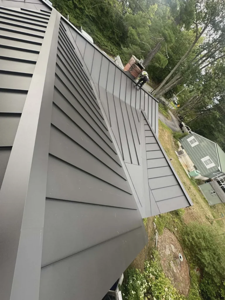 Roof replacement in progress on a home in Massachusetts