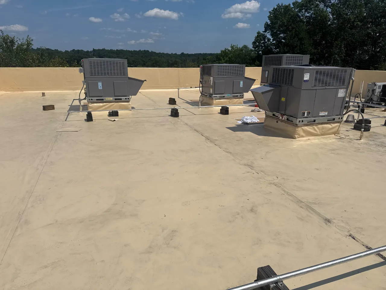 Ponding water on a flat roof in Massachusetts